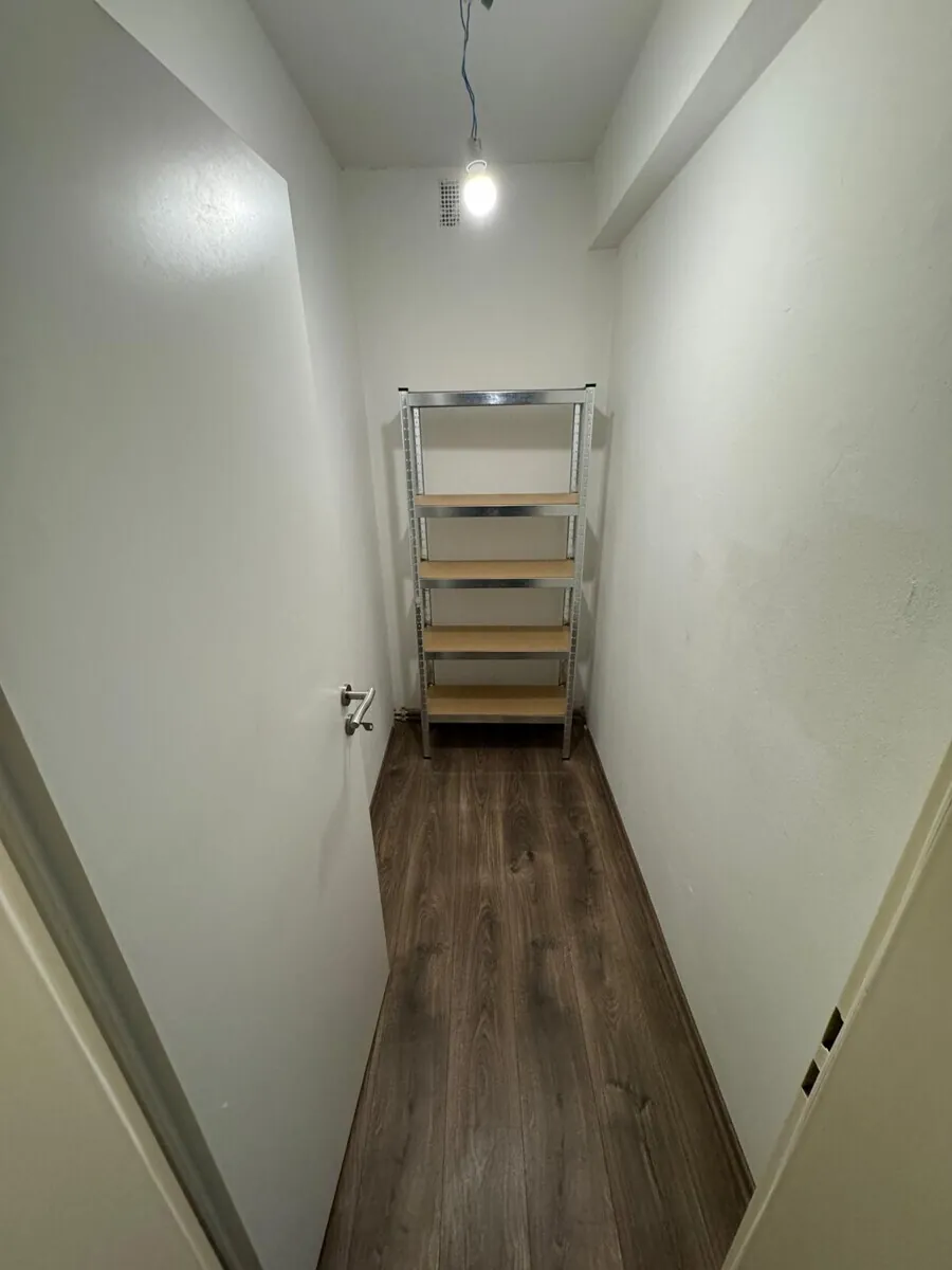 Mehrfamilienhaus mit 8 Wohnungen und 8 Garagen, Bild 6