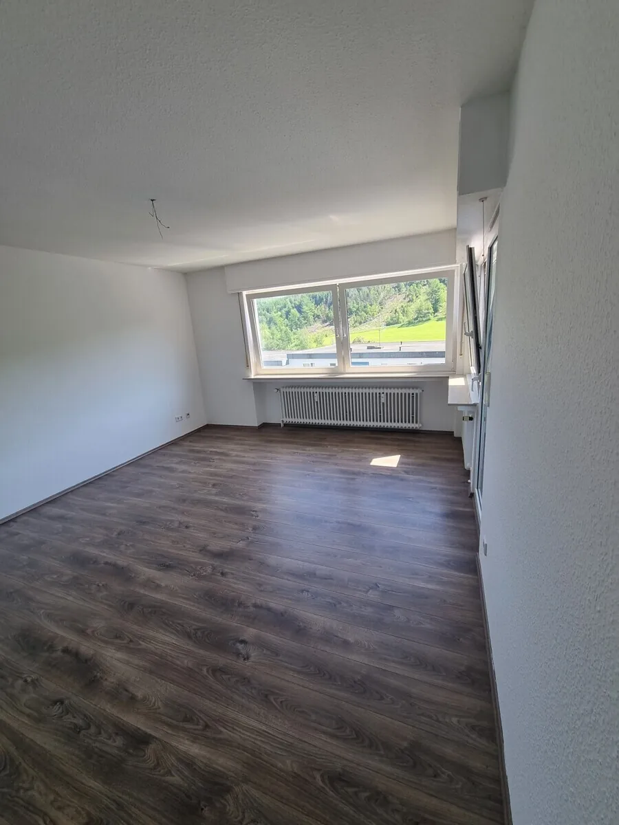 Mehrfamilienhaus mit 8 Wohnungen und 8 Garagen, Bild 12